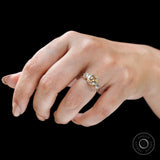 Top wear view champagne moissanite three stone ring on hand