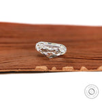 Side profile elongated cushion brilliant cut lab diamond on wood