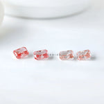 Row of radiant pink loose lab diamond pairs