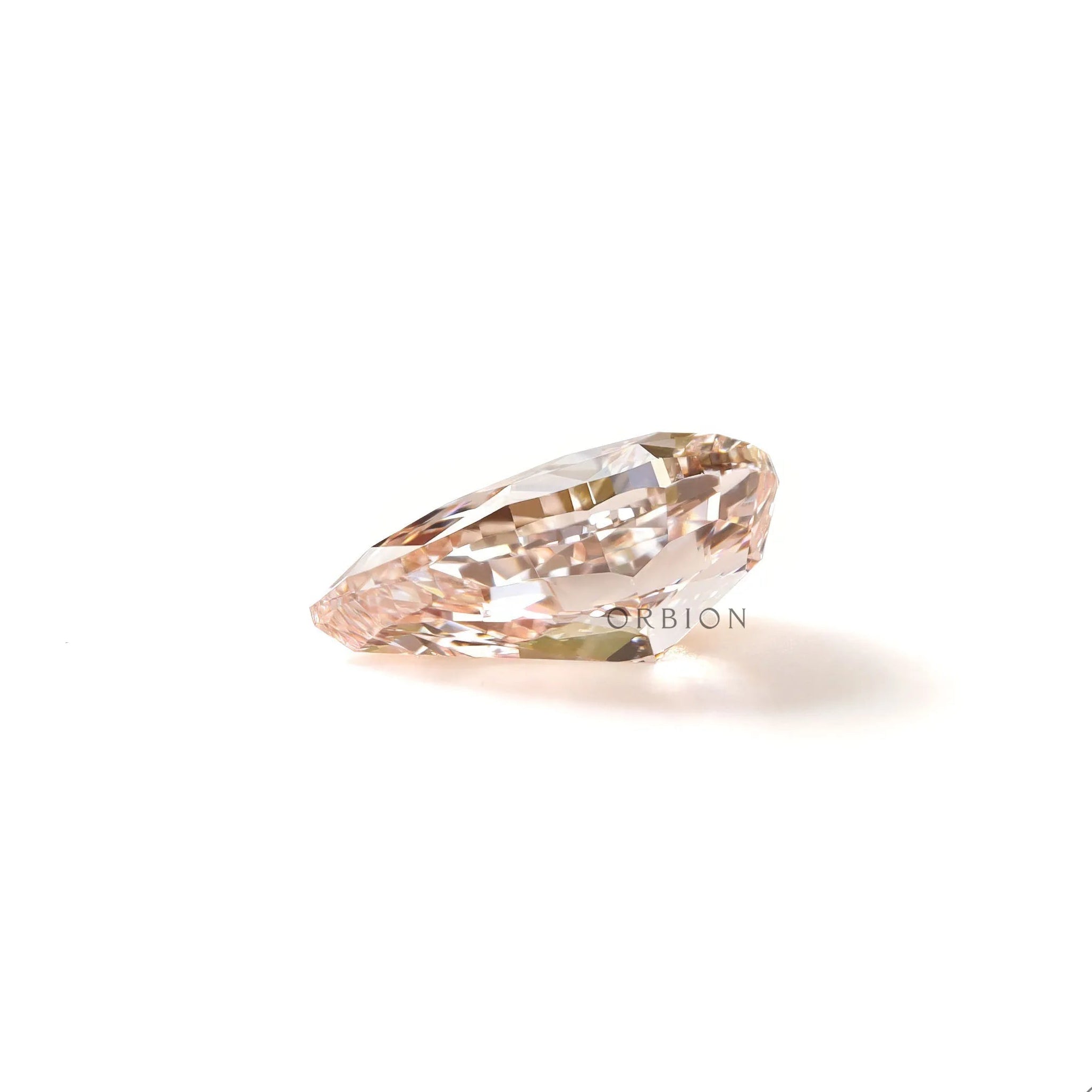 Side profile of fancy vivid pink pear lab diamond