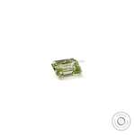 Emerald cut fancy green loose diamond resting flat