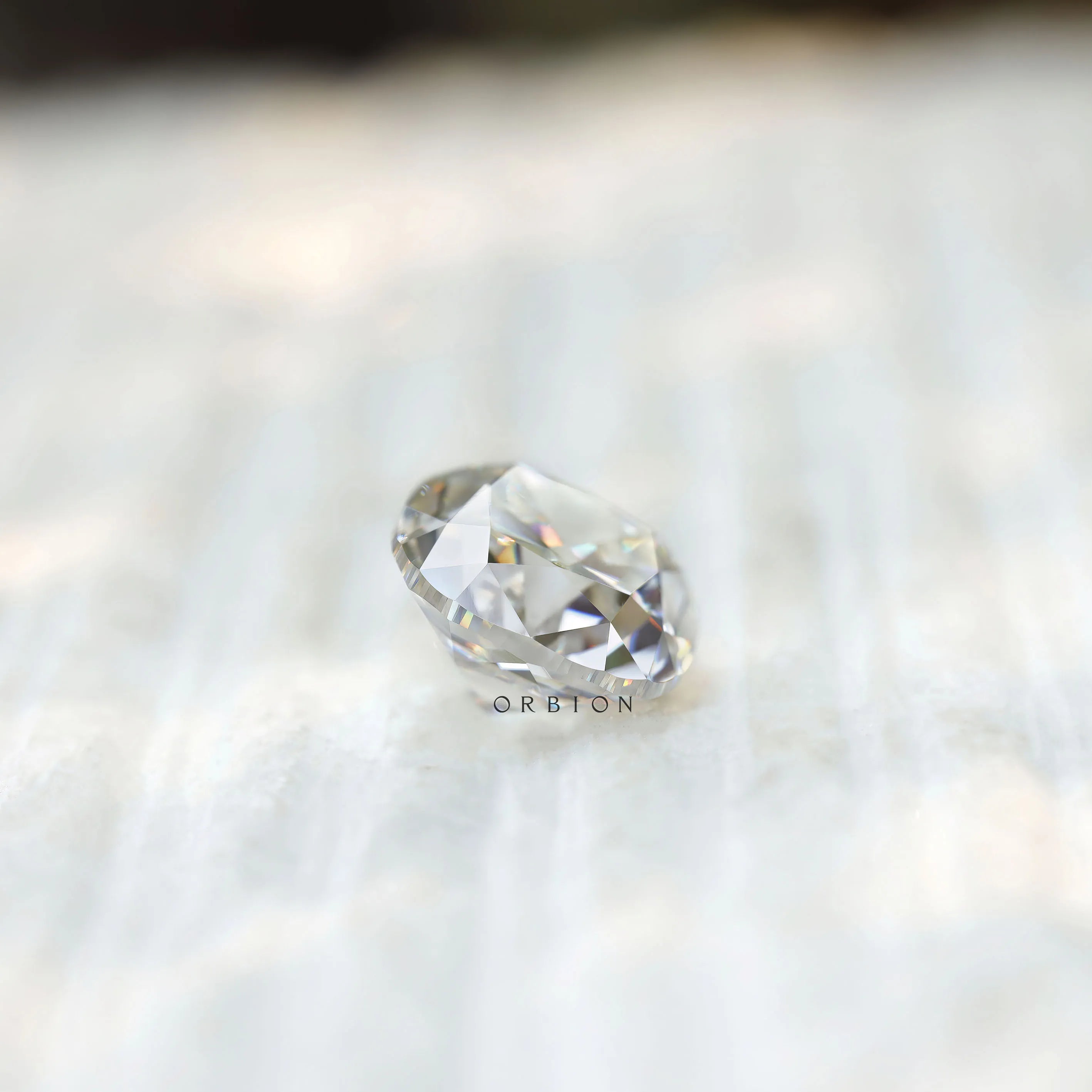 Old mine cut cushion moissanite with pavilion facet view