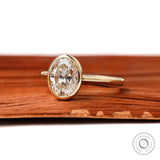 Floating Style Oval Moissanite Ring, 2ct Oval Engagement Ring in 14k Yellow Gold with a Unique Flow to Flush Set any Wedding Band Seamlessly