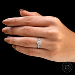 Detailed view of the Art Nouveau leaf design on engagement ring
