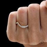 Diamond wedding band worn on hand with elegance