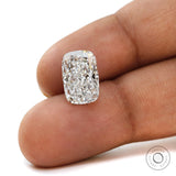 Elongated cushion crushed ice loose lab diamond shown on fingertips