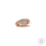 Loose oval pink diamond placed flat showing pavilion reflections