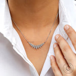 Glossy 14k white gold contemporary diamond necklace close-up
