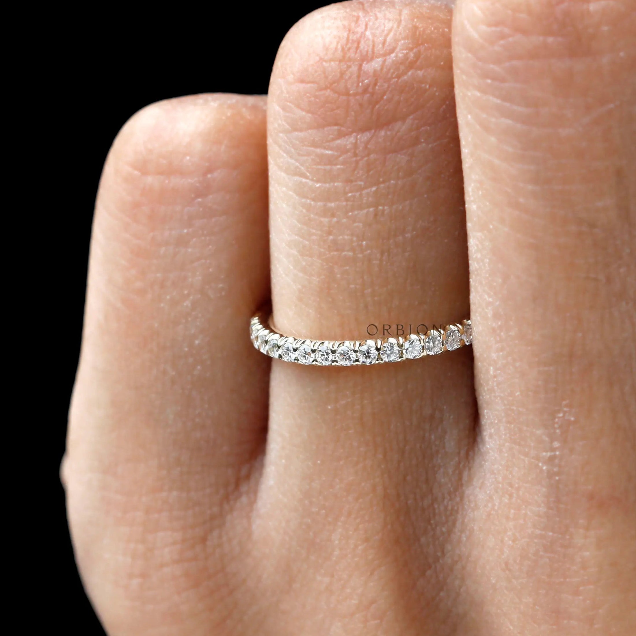 Minimalist round moissanite wedding band women