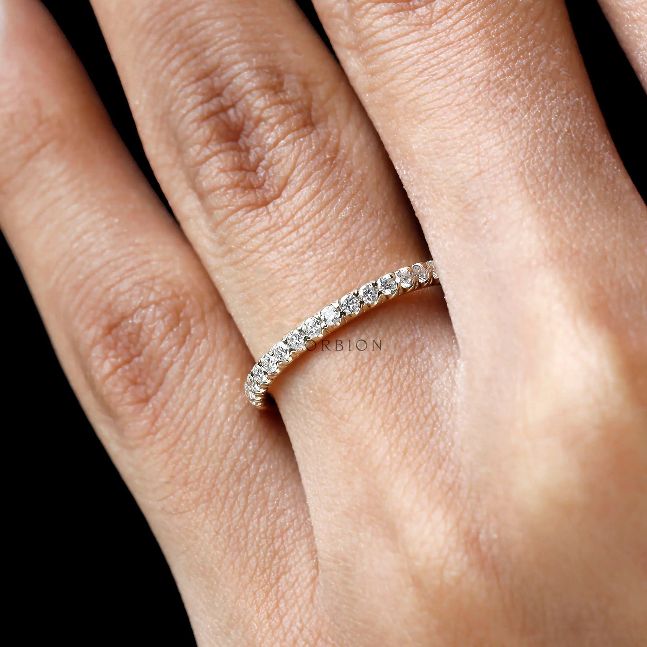 Round lab diamond half eternity stacking band close up