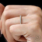Thin yellow gold anniversary band with 0.26 TCW diamonds
