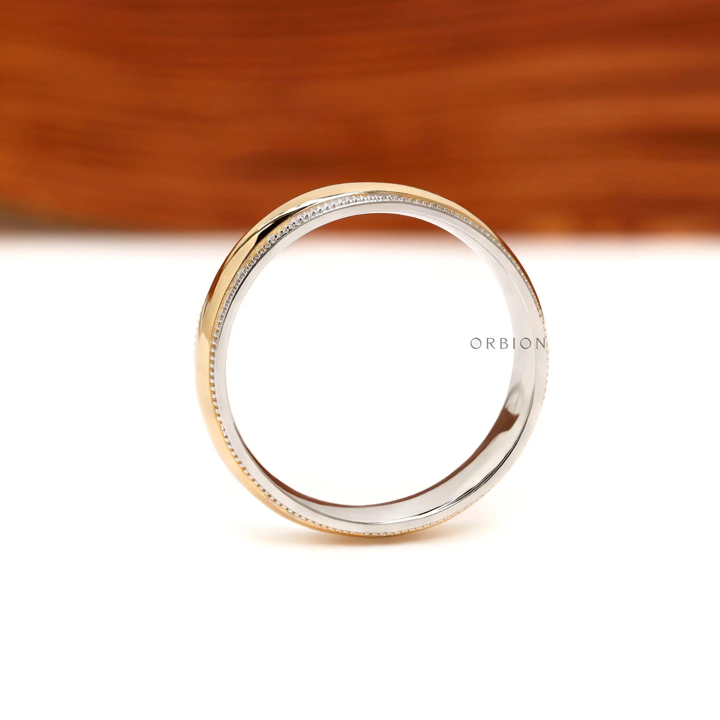 Close up milgrain detail mens two tone wedding ring