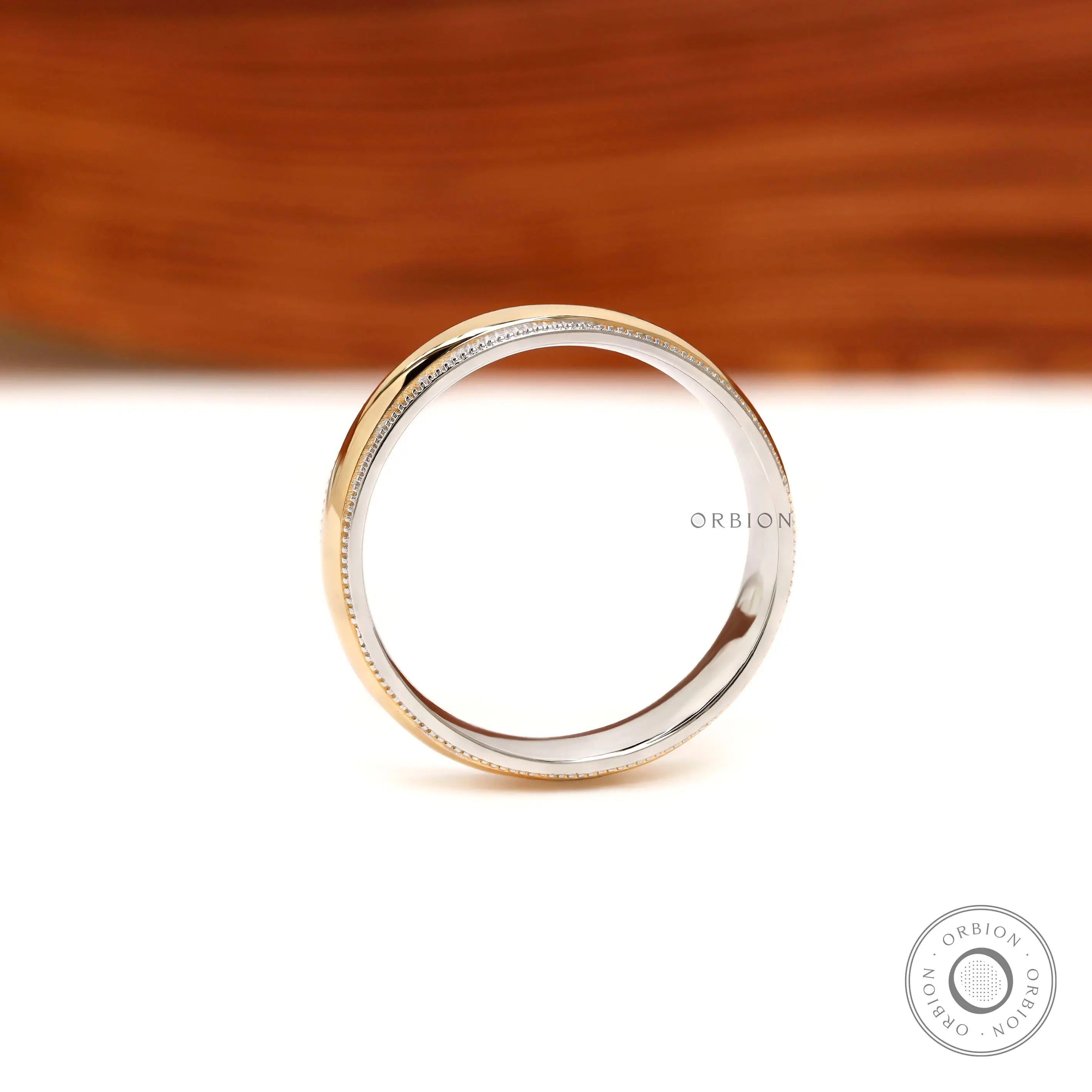 Close up milgrain detail mens two tone wedding ring