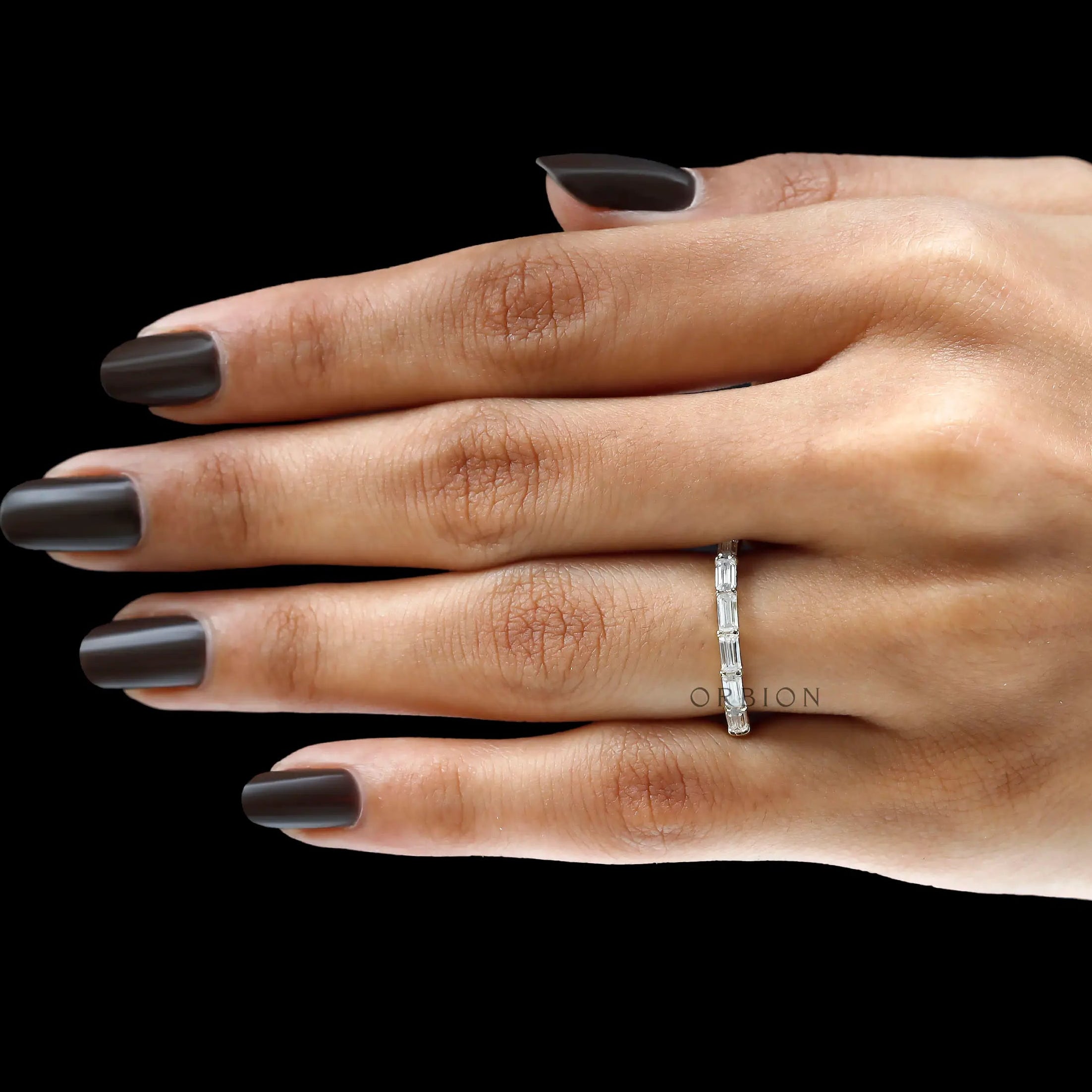 Delicate emerald cut half eternity stacking band yellow gold