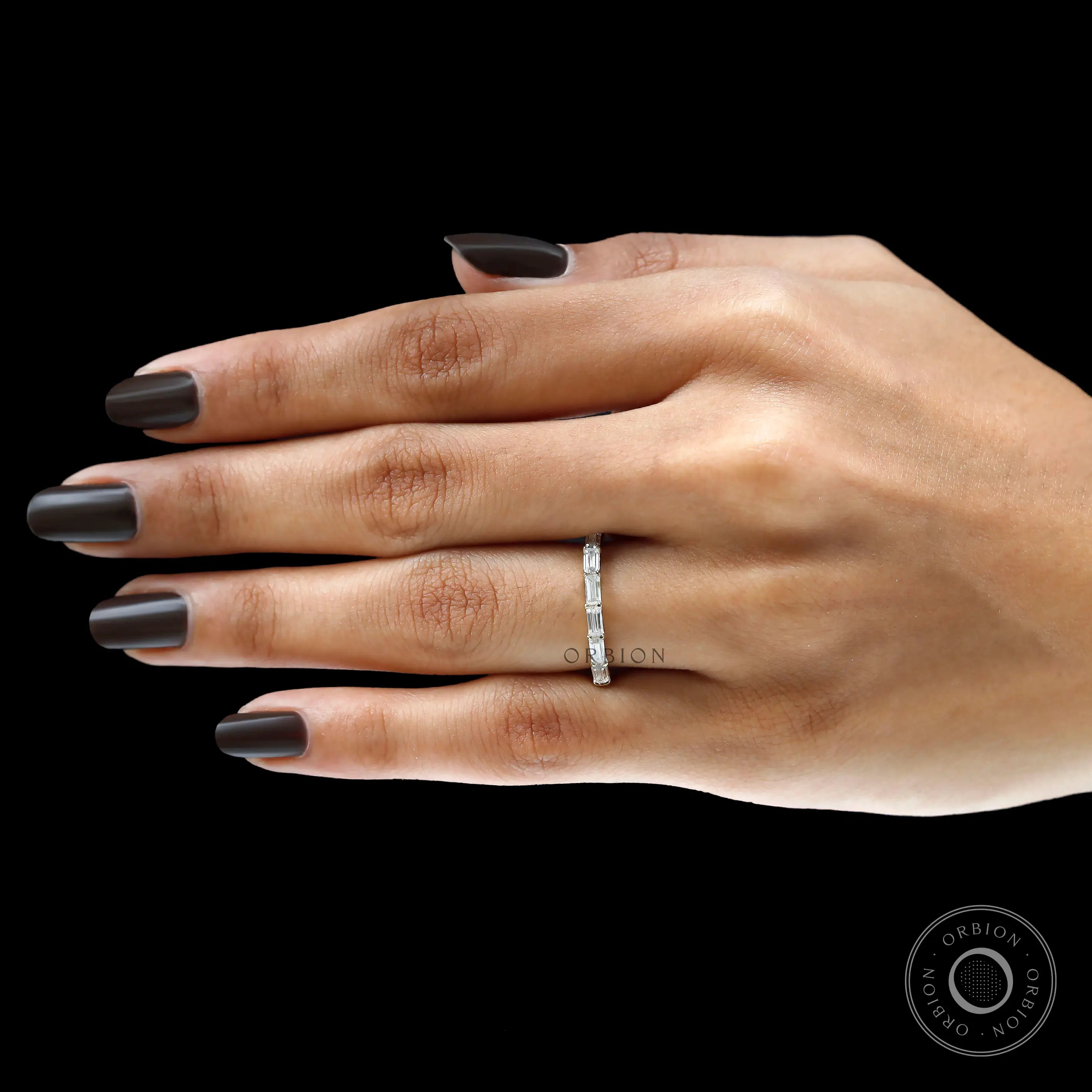 Delicate emerald cut half eternity stacking band yellow gold