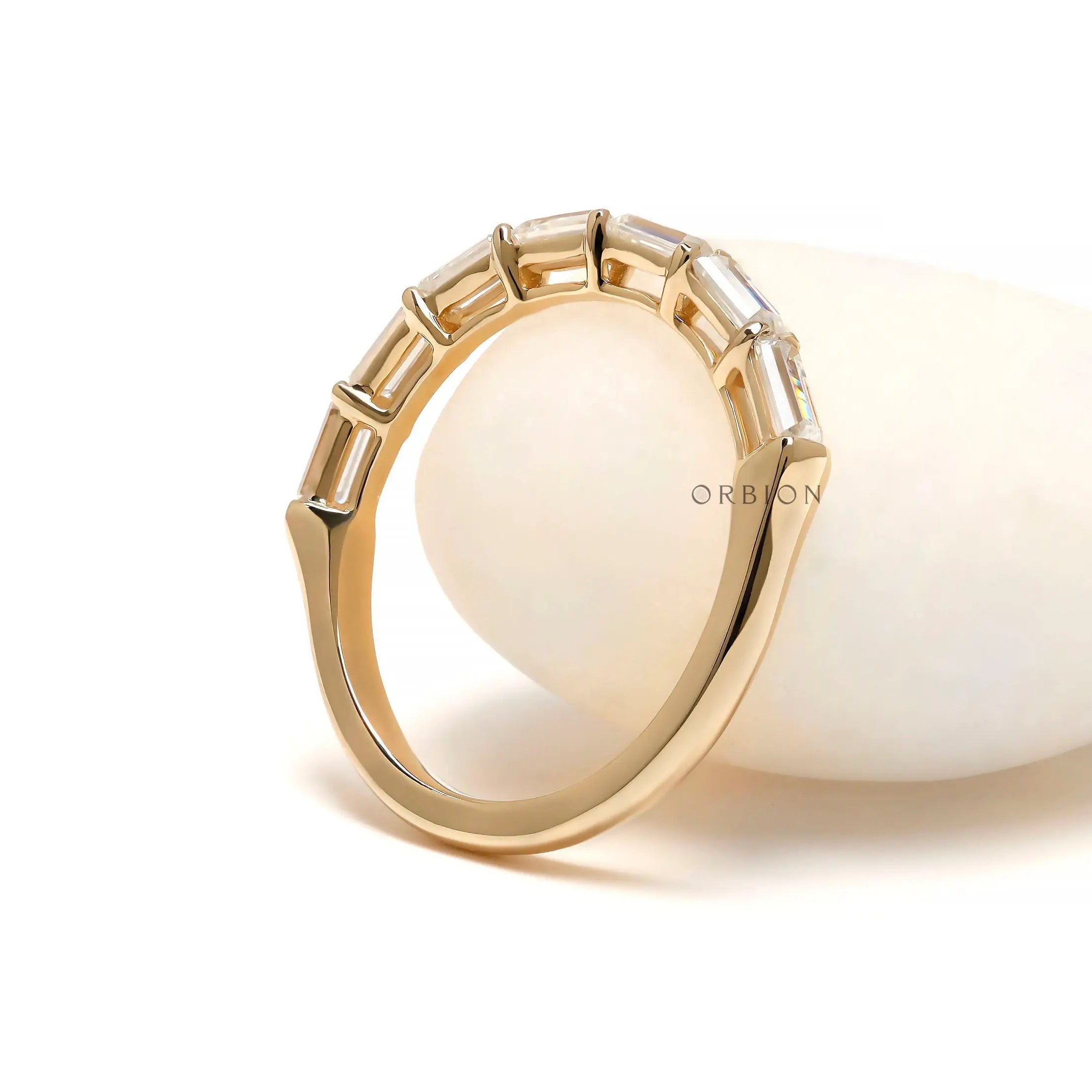 Half eternity emerald cut diamond band ring yellow gold
