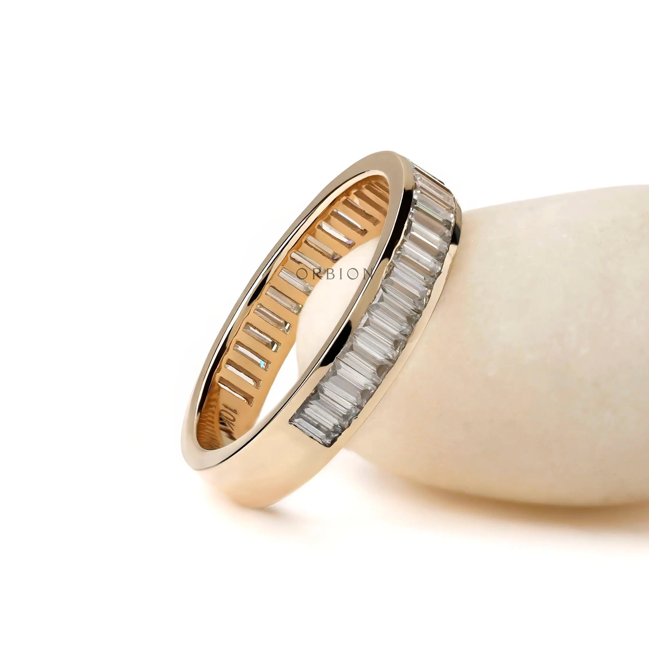 Side profile of channel set baguette moissanite band
