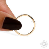 Full side view of slim moissanite curved wedding band