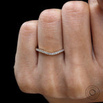 Hand model front view of half eternity curved moissanite band