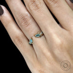 Green gemstone leaf cuff ring in yellow gold, inspired by nature, ideal for stacking or wedding band