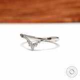 V shaped wishbone wedding band in platinum with black and white gemstone detailing for stacking