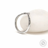 Minimalist platinum wishbone stacking ring with curved V shape and unique gemstone accents