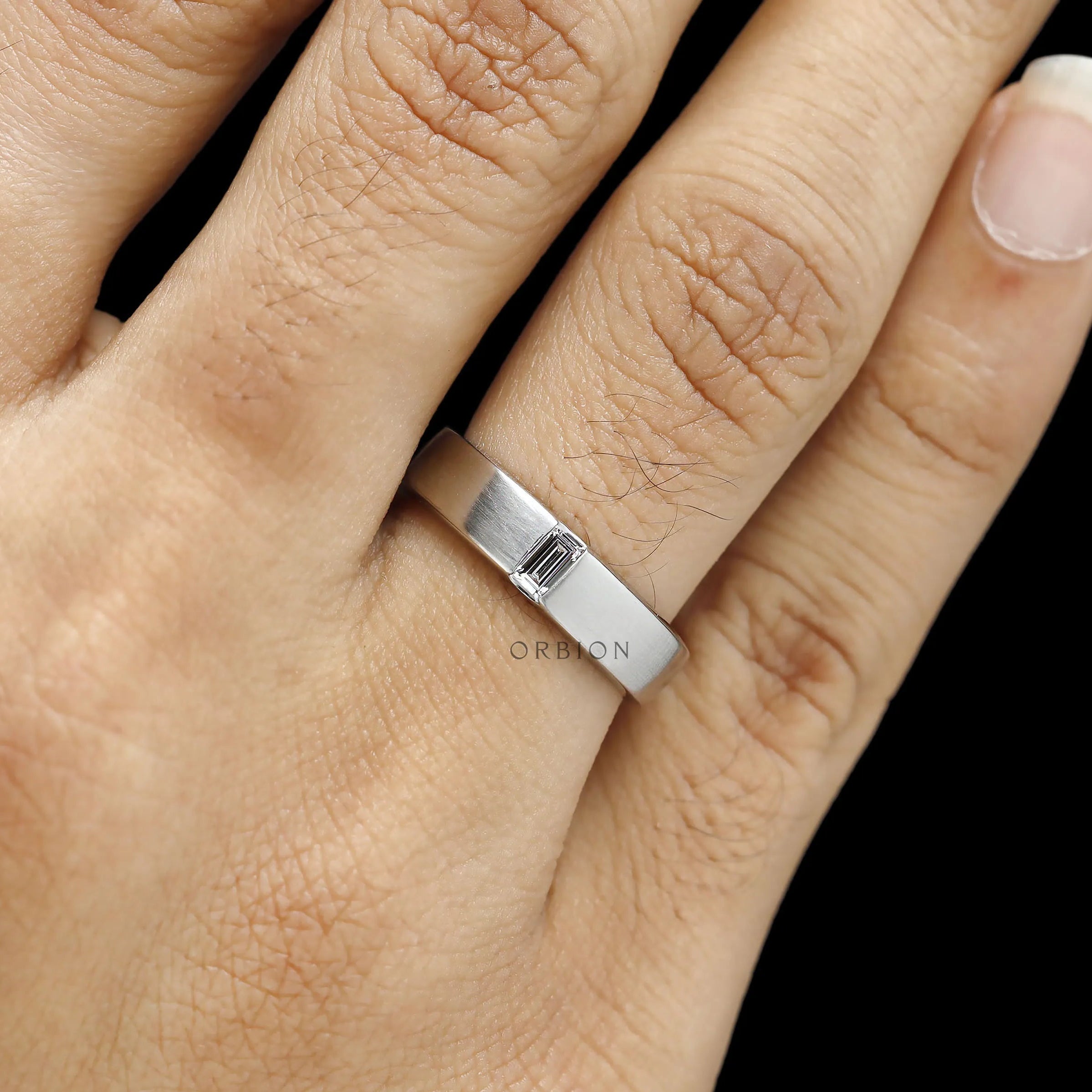 Contemporary men’s platinum promise ring with baguette diamond band design, perfect for weddings and anniversaries