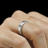 Platinum diamond wedding band for men featuring a matte surface, 5 mm width, and baguette stone 