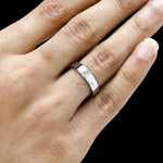Contemporary platinum promise ring for men with baguette diamond perfect as a wedding or thumb ring