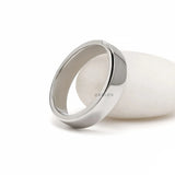 Elegant men’s diamond wedding band with baguette stones, sleek platinum setting, and anniversary ring style