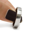 Unique men’s platinum ring with baguette lab diamond, comfort fit band and brushed matte finish