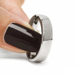 Unique men’s anniversary band with platinum construction, baguette diamond accents and comfortable fit design