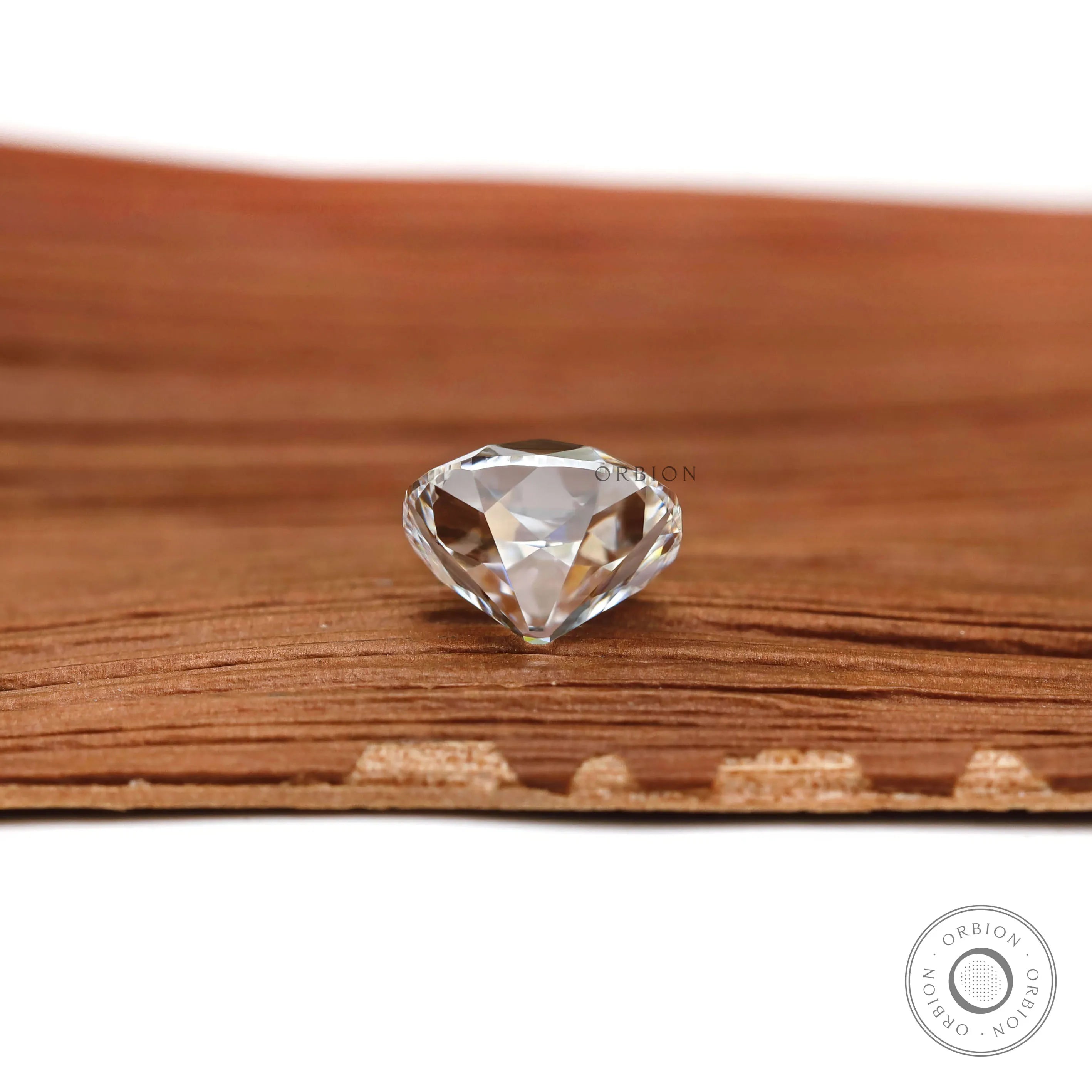 Ethical 2 ct lab diamond cushion cut with old mine vintage facets