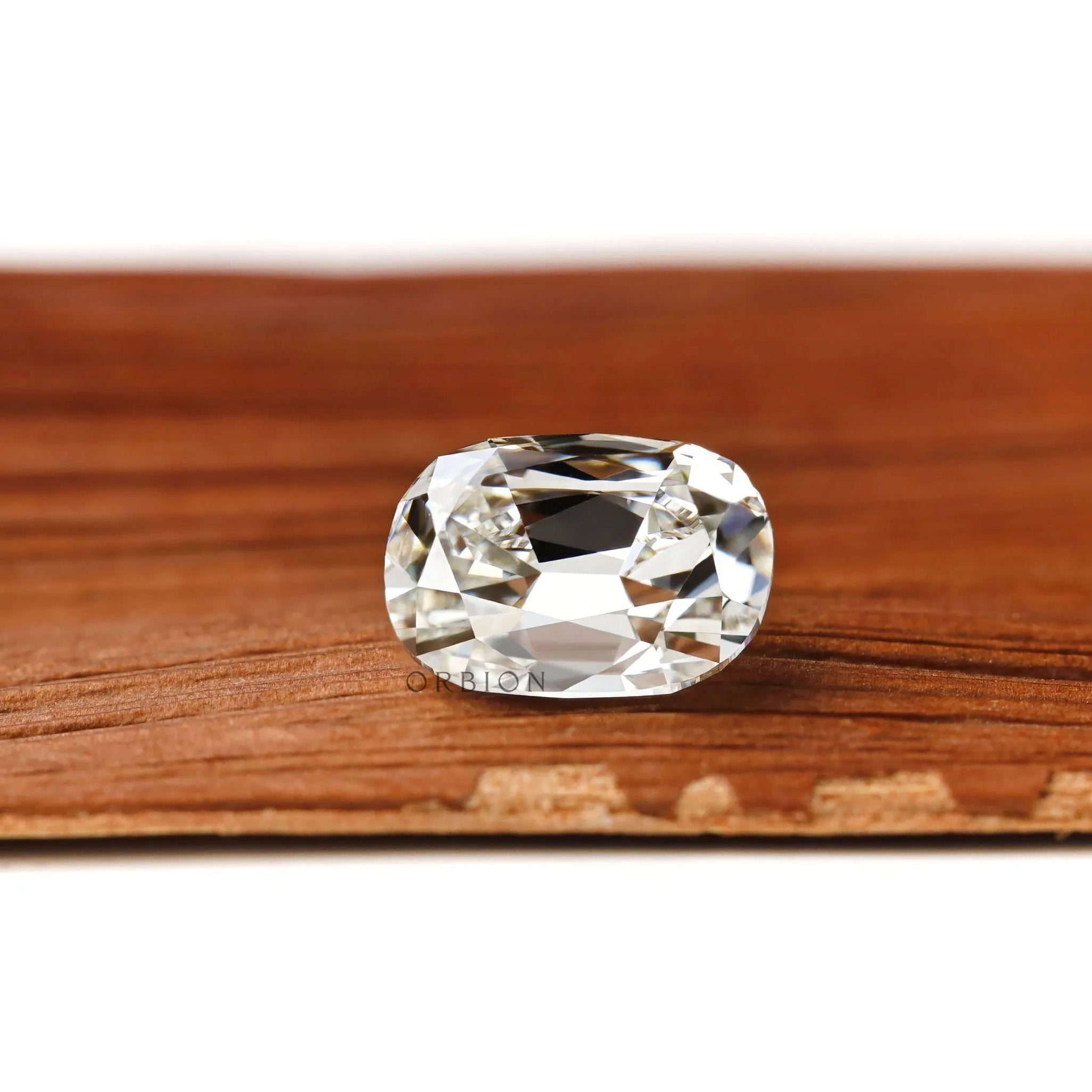 4 ct Elongated cushion lab diamond with clean base and antique faceting