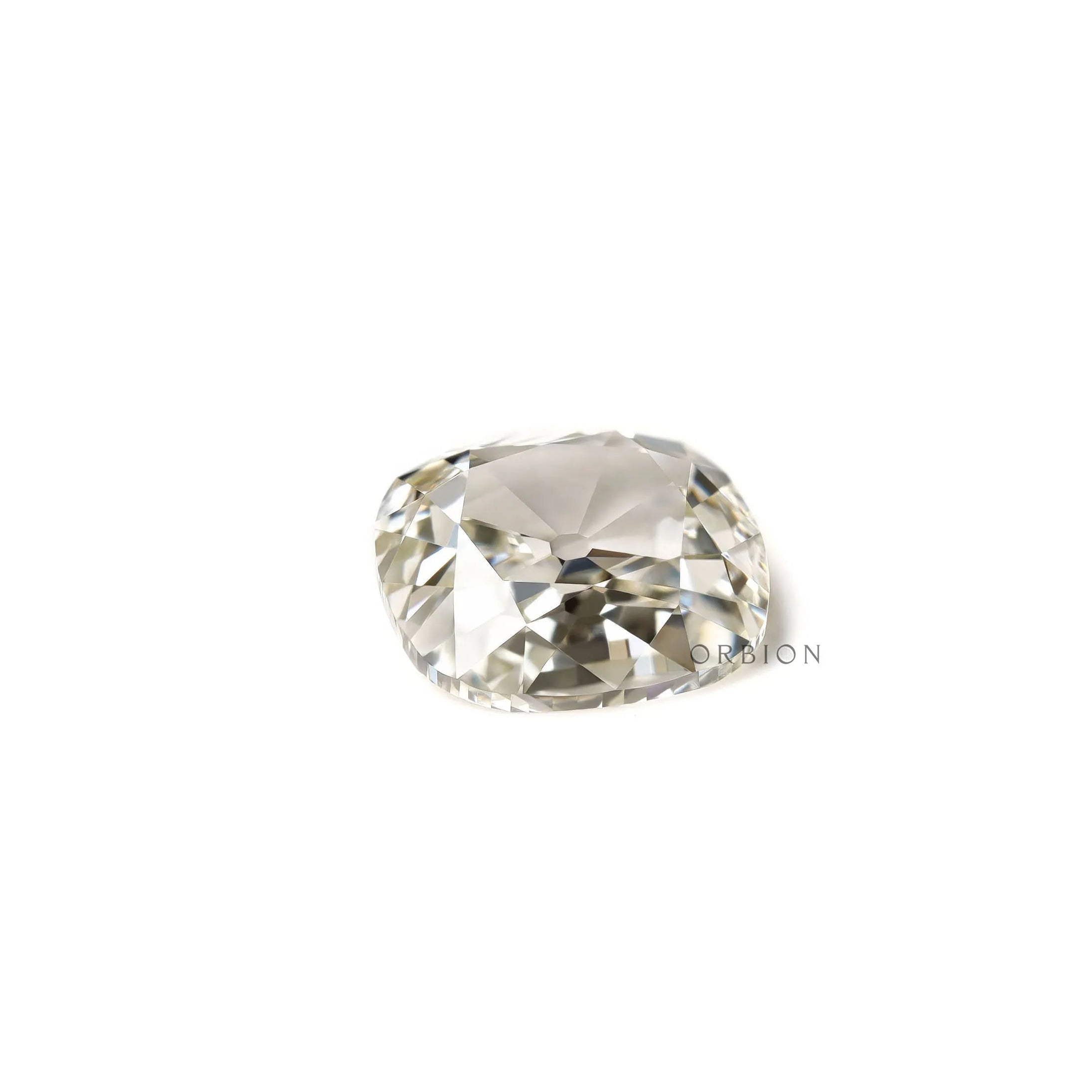 Antique cut off white cushion diamond solitaire