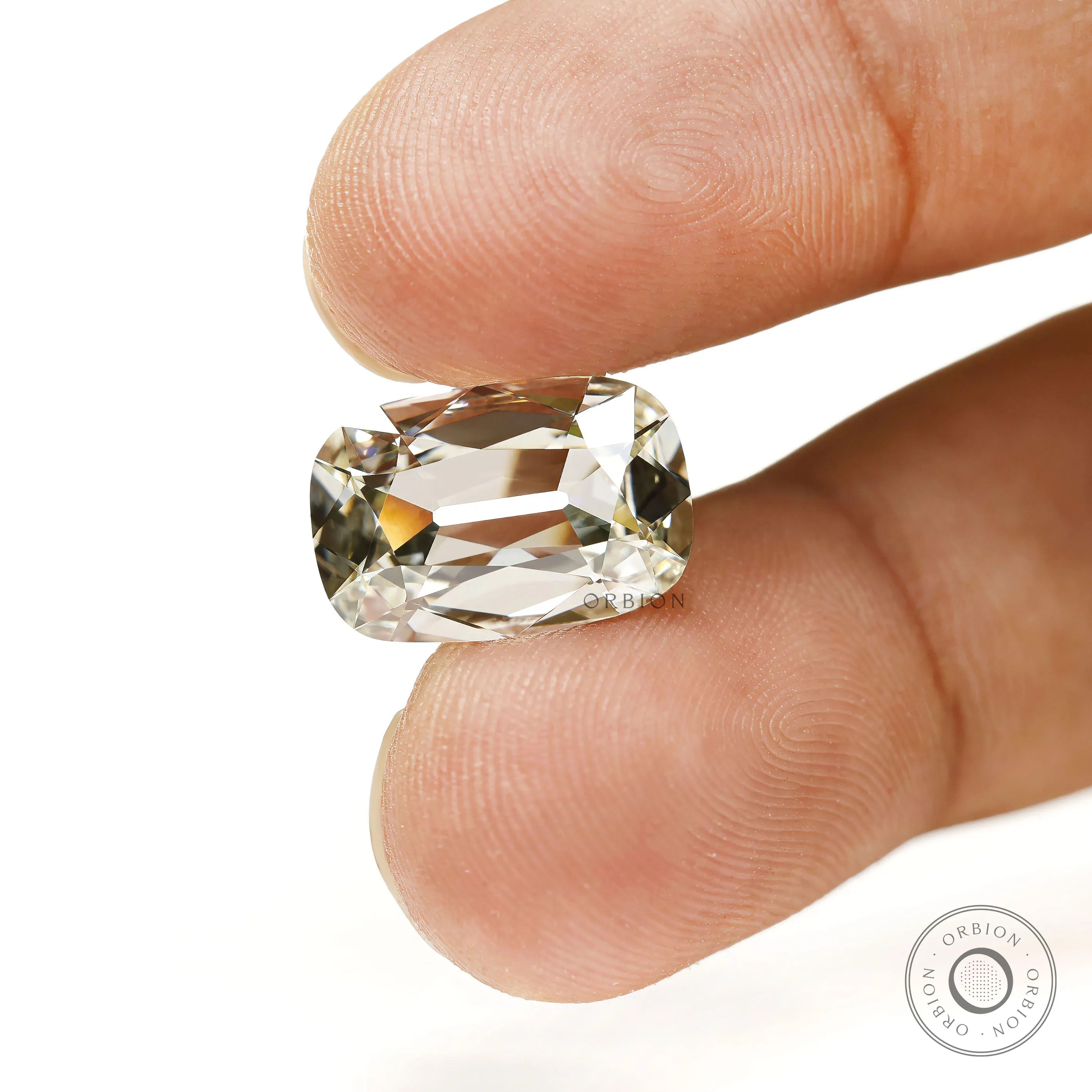 OMC warm color elongated cushion lab diamond bar culet