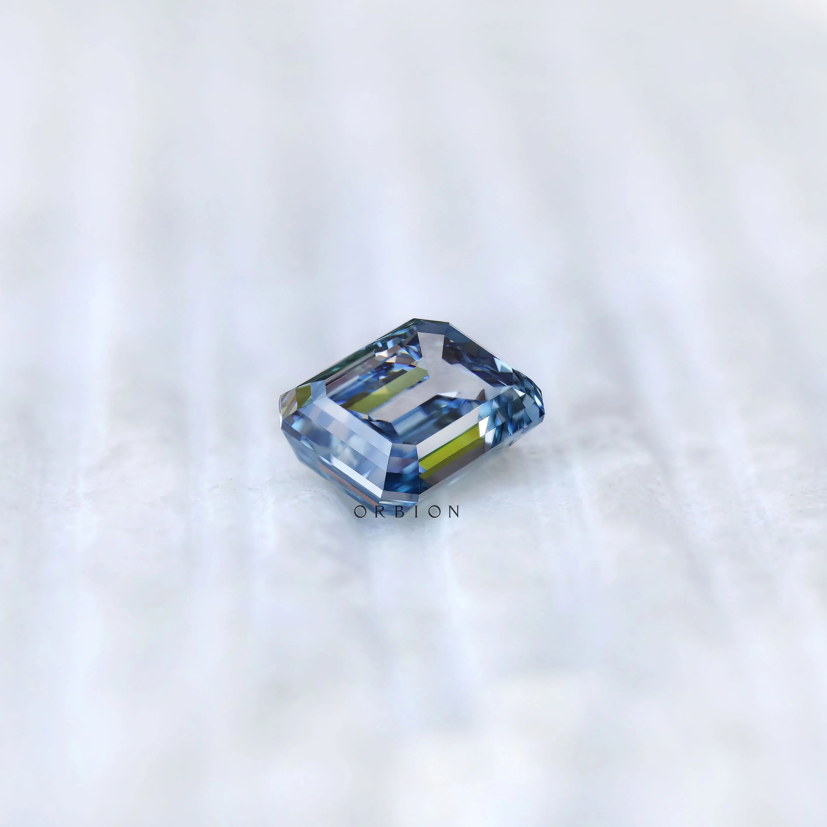 3 ct Blue lab diamond with step cut emerald style facets