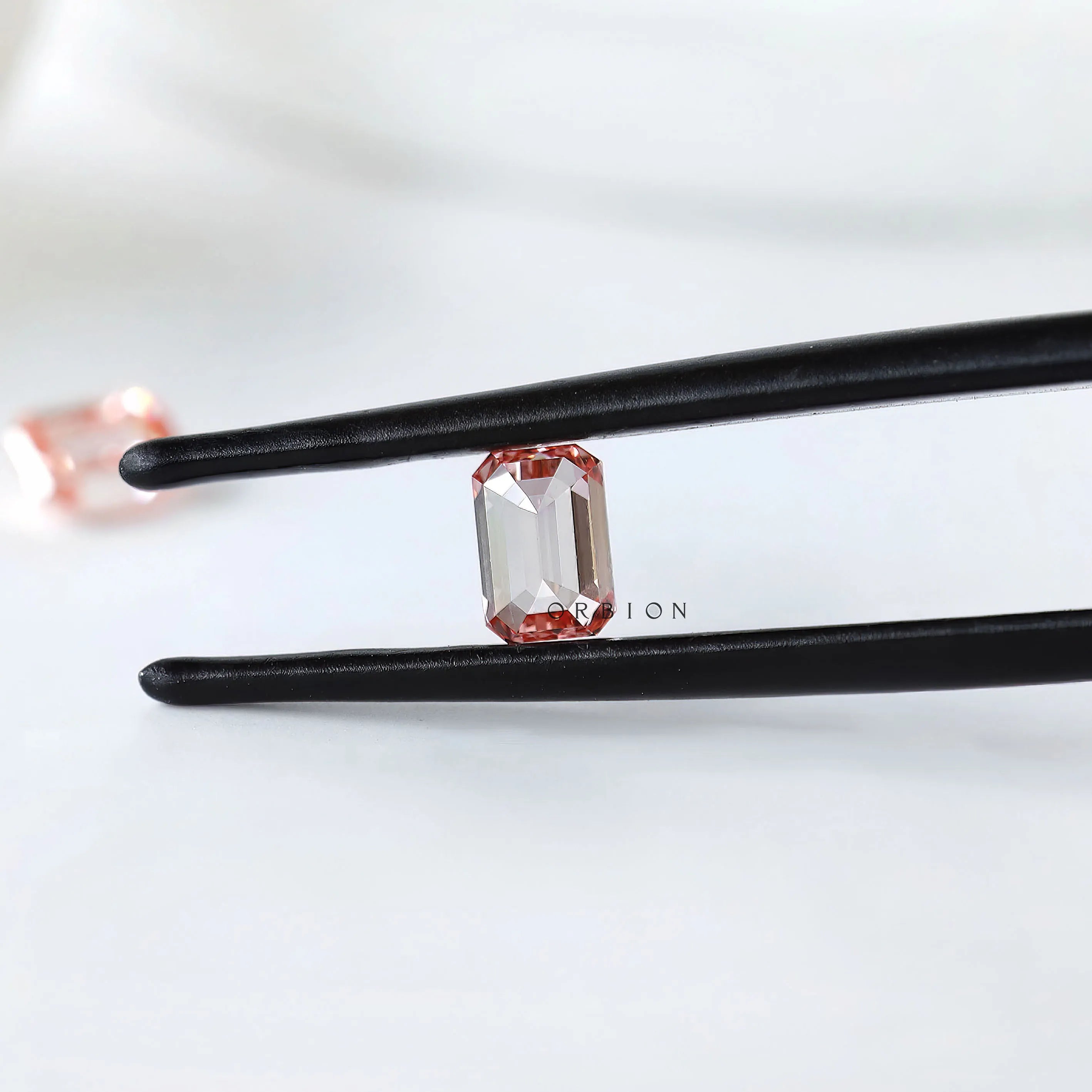 Matching pink emerald cut lab diamonds for custom earring setting