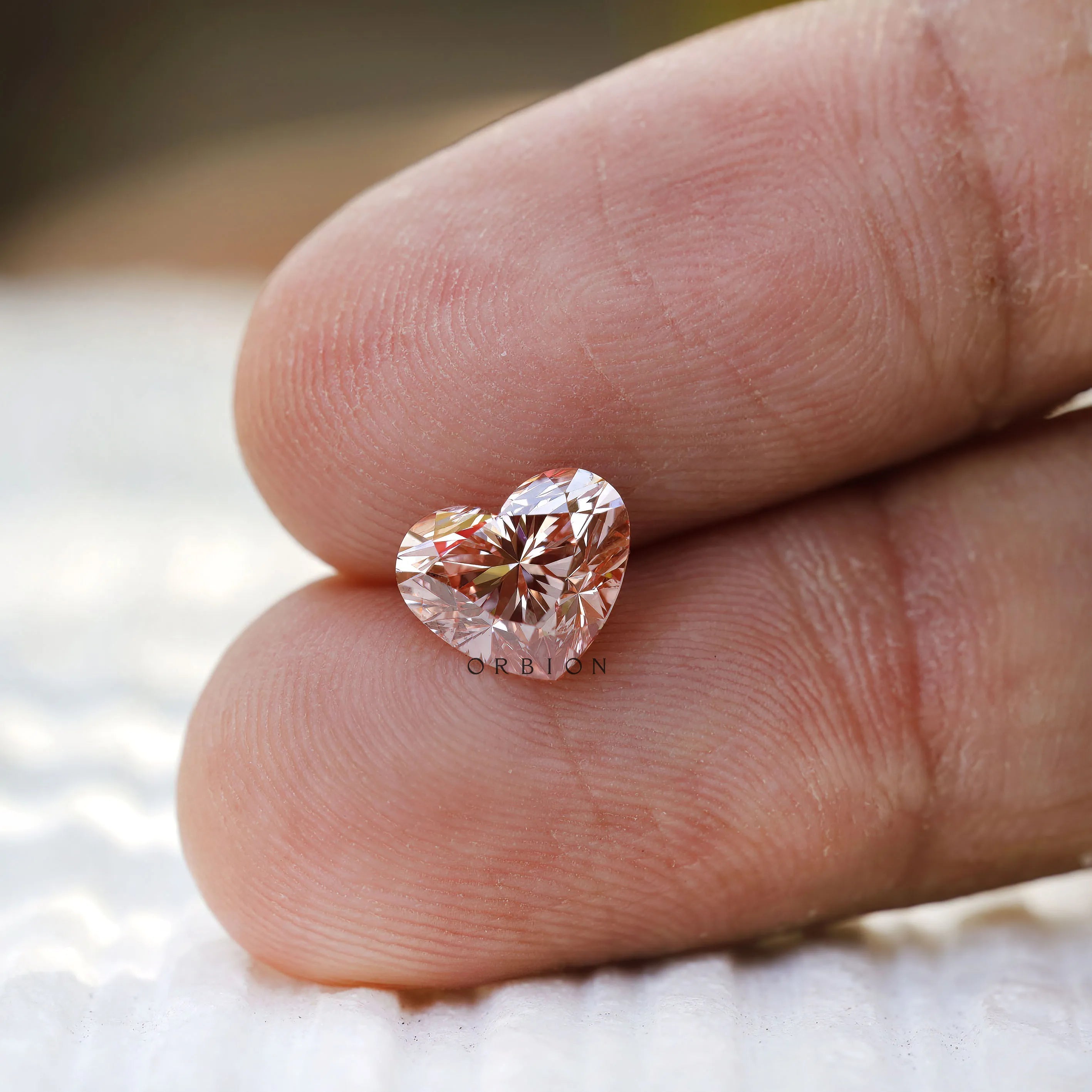 2 ct Heart shaped lab diamond in vivid pink tone with sparkle
