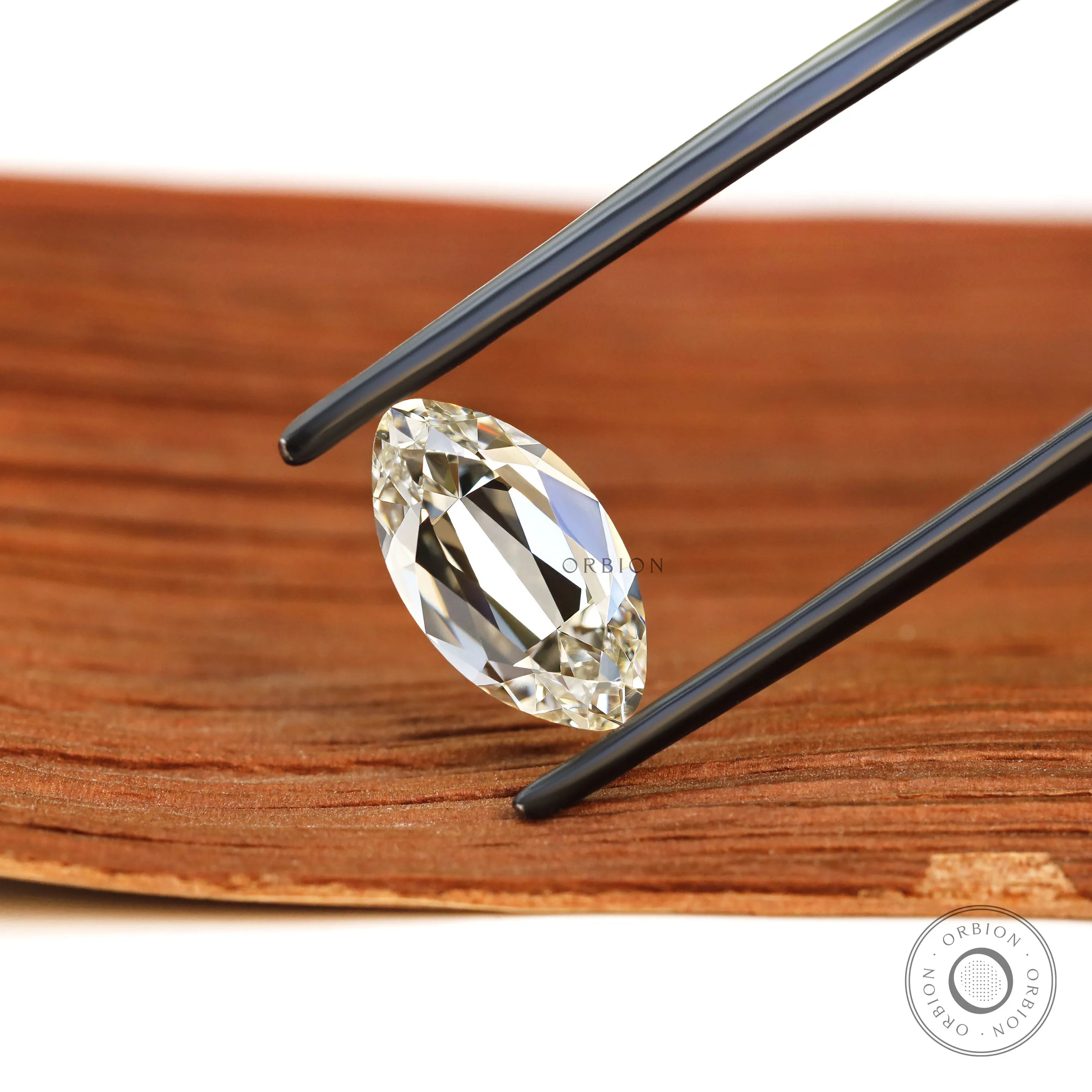 Warm tone moval lab diamond 2 ct with vintage inspired faceting