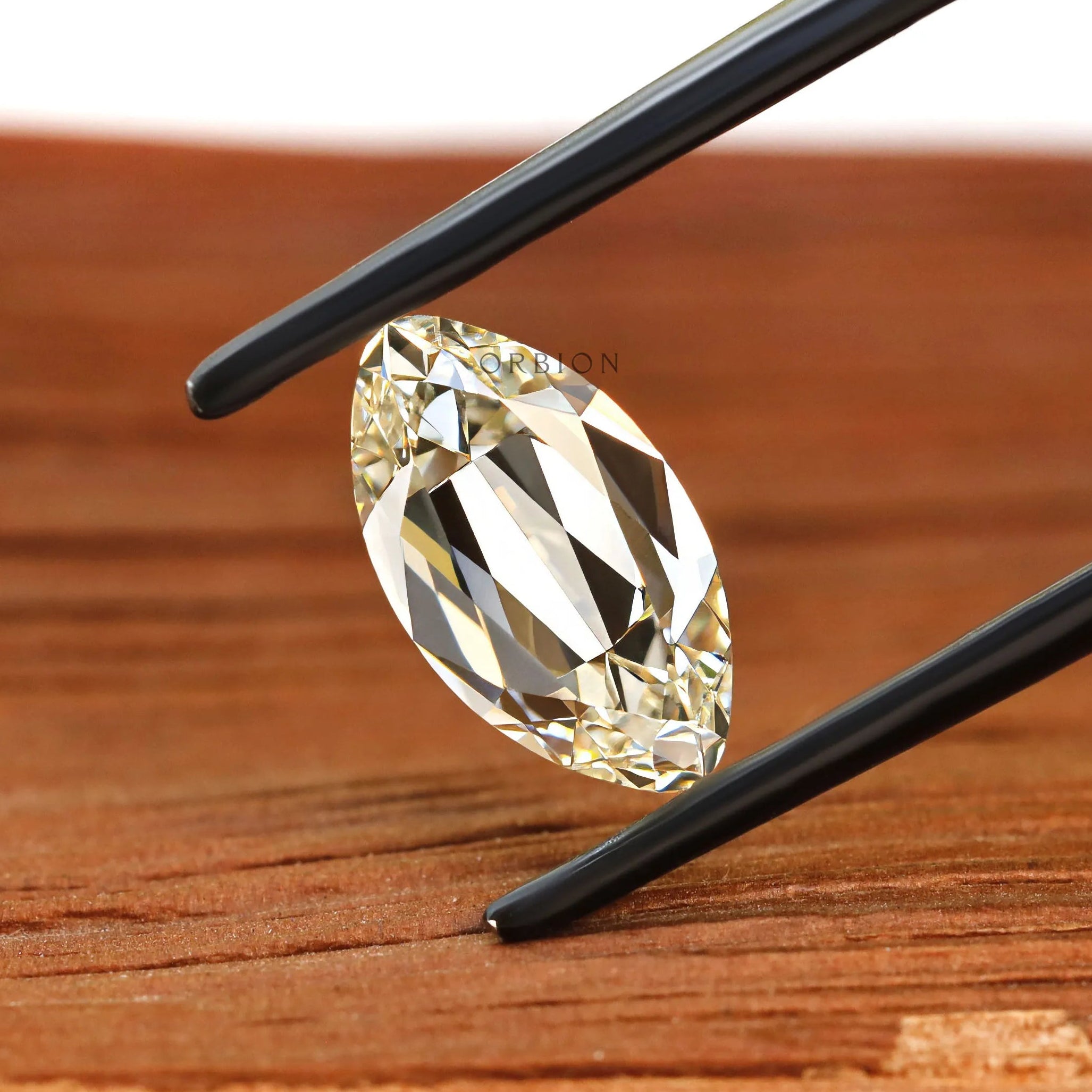 2 ct Moval lab grown diamond with warm antique cut and soft brilliance