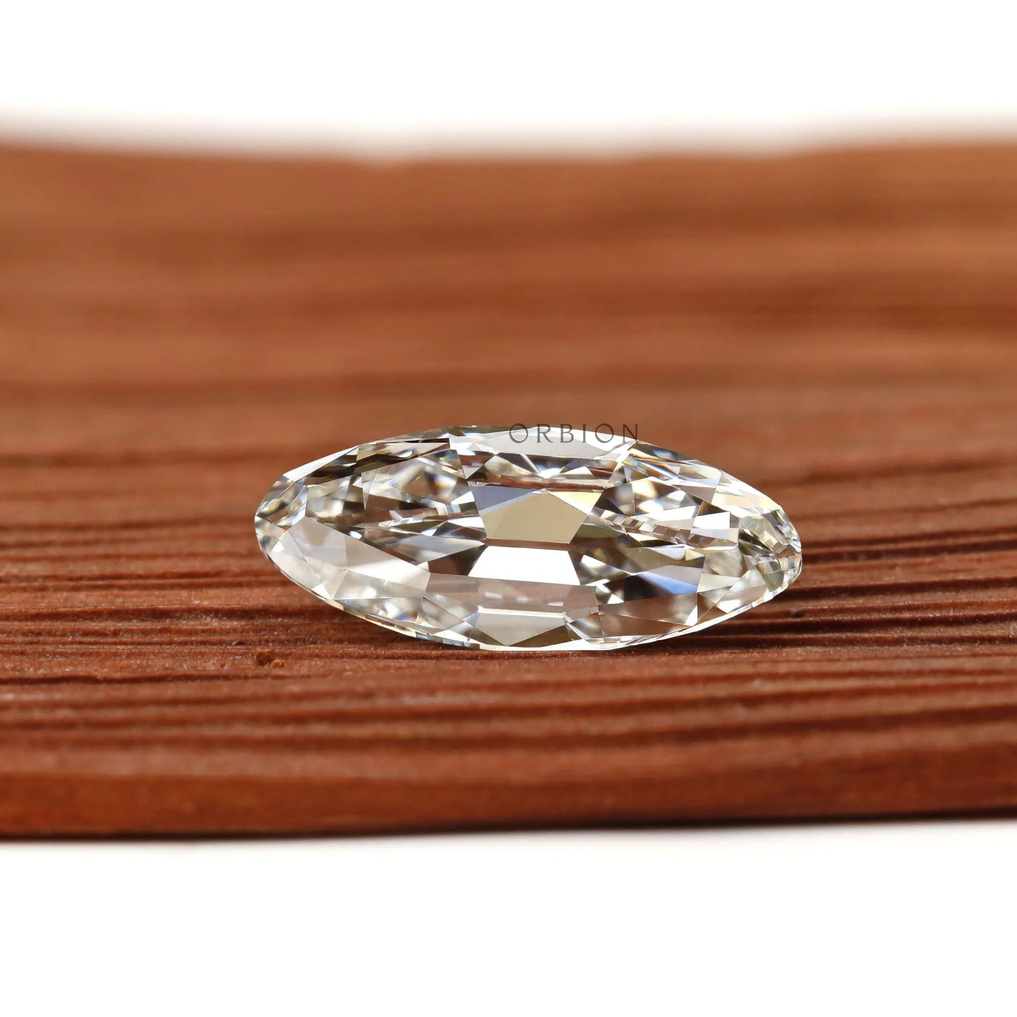 Moval cut lab diamond 2 ct with old mine faceting and bar culet detail