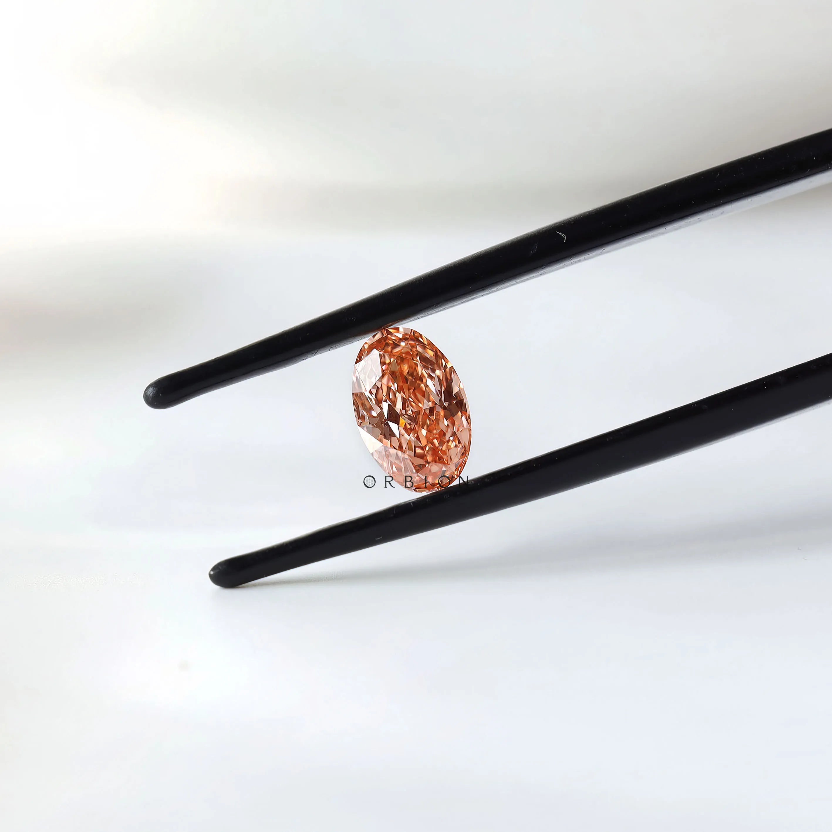 0.73 ct Oval lab grown diamond with rich intense pink color