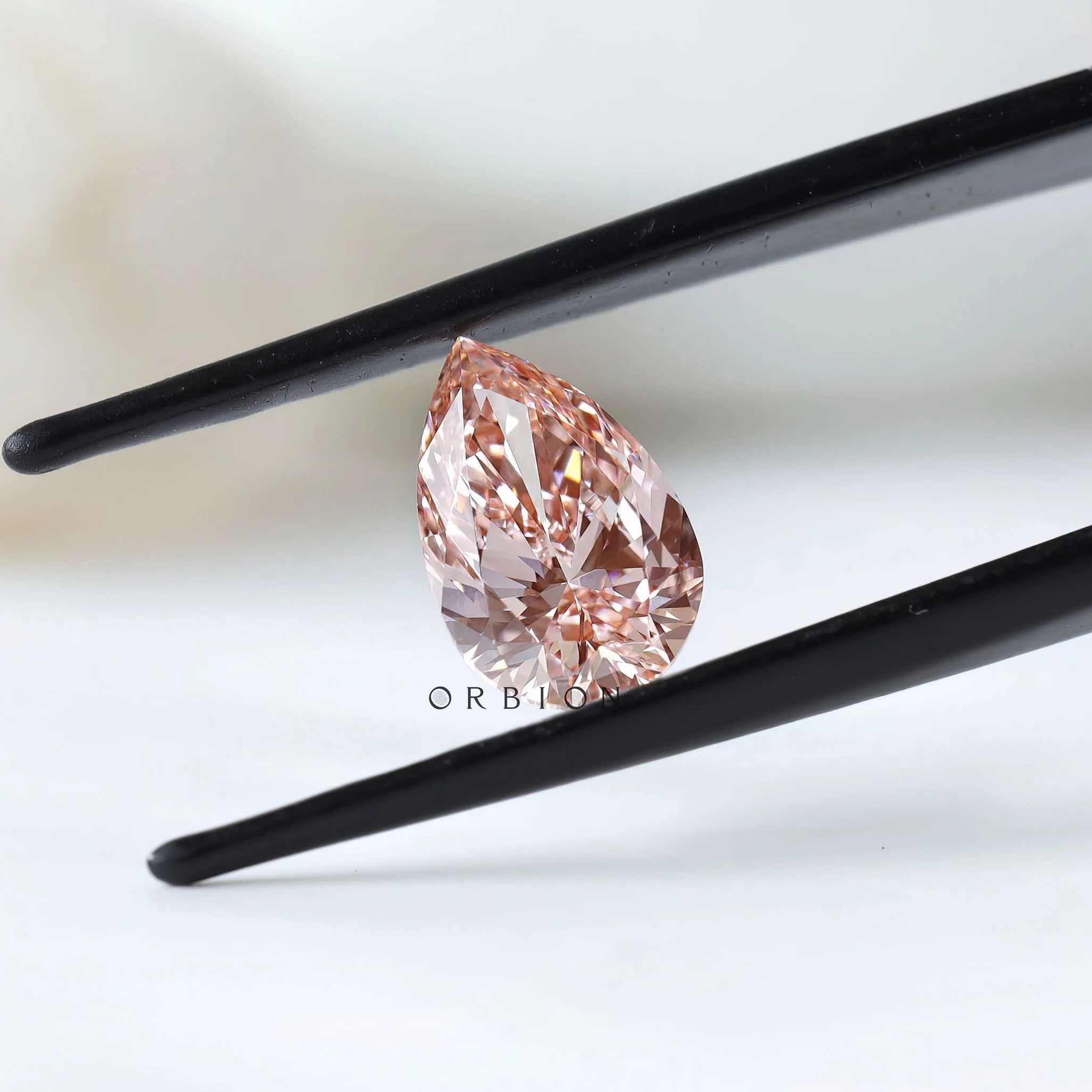 2 ct Vivid orangy pink lab diamond pear cut fine gemstone