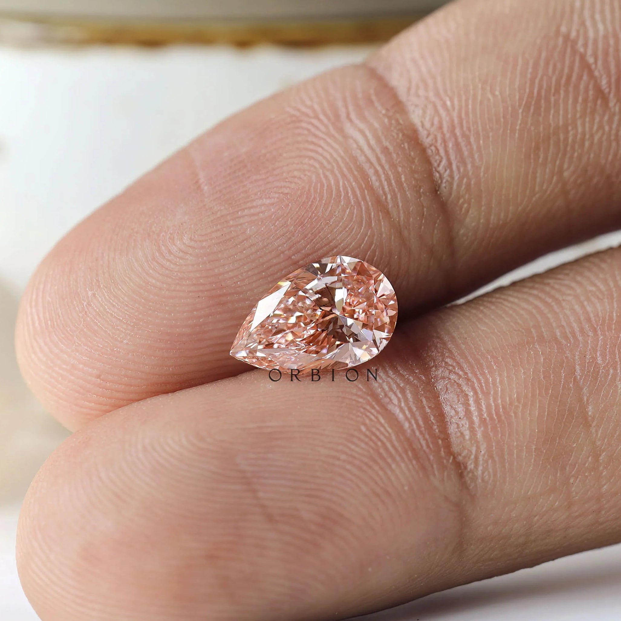 Bold pear cut orangy pink lab diamond 2 ct loose stone