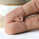 2 ct Pear lab diamond with vibrant orangy pink color tone