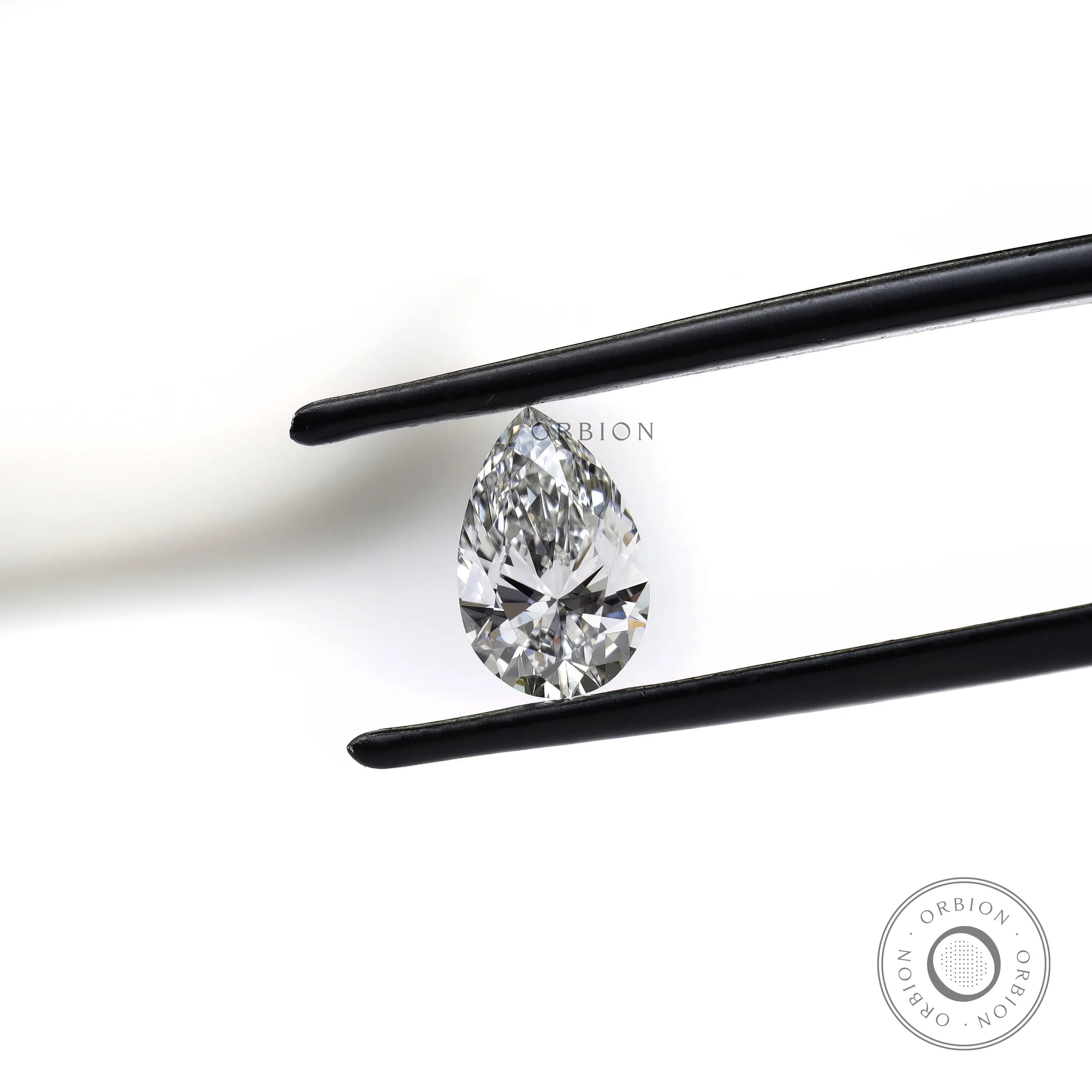 Pear cut lab grown diamond 2 ct with subtle off white shade
