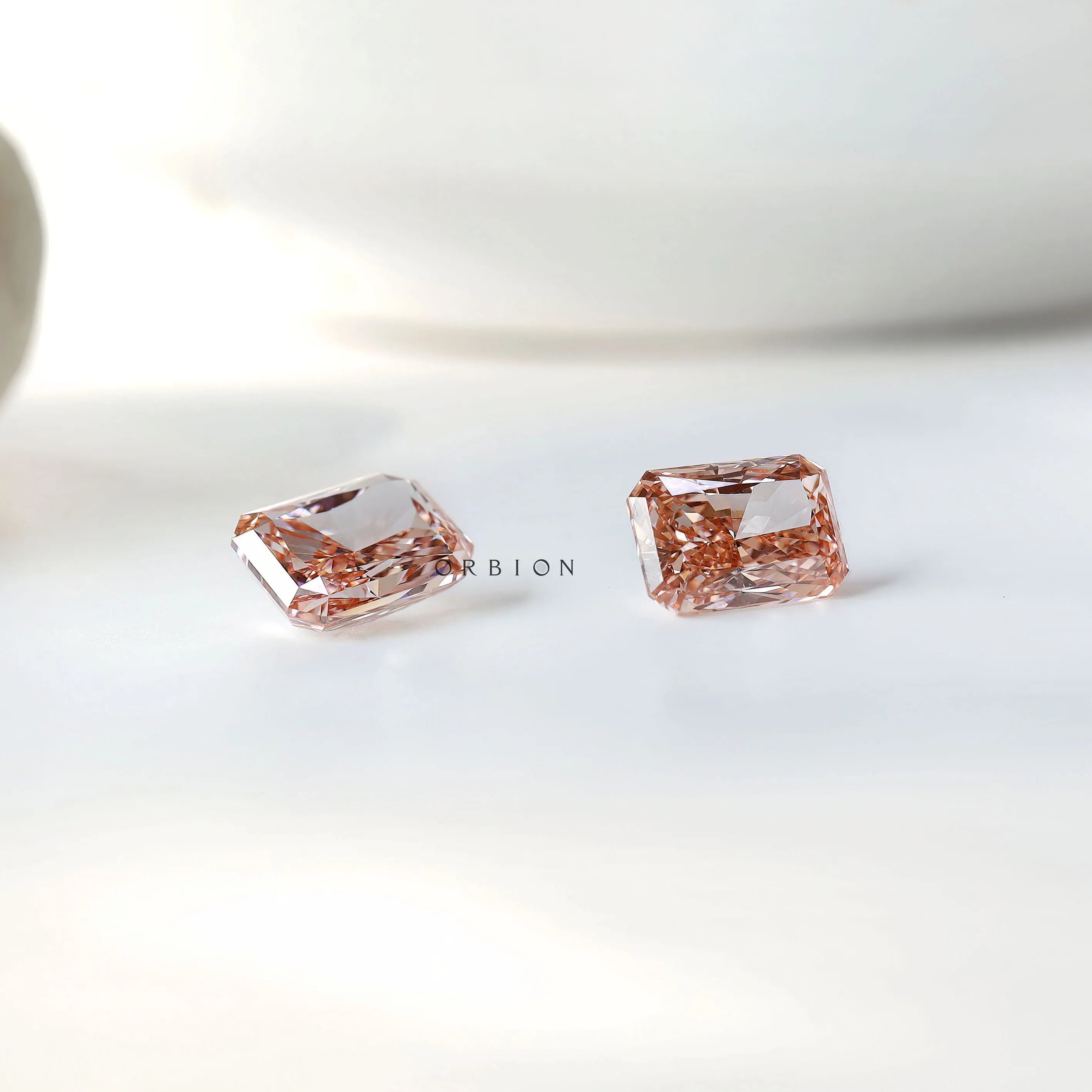 1.70 ct Radiant cut lab diamond in gentle pink shade