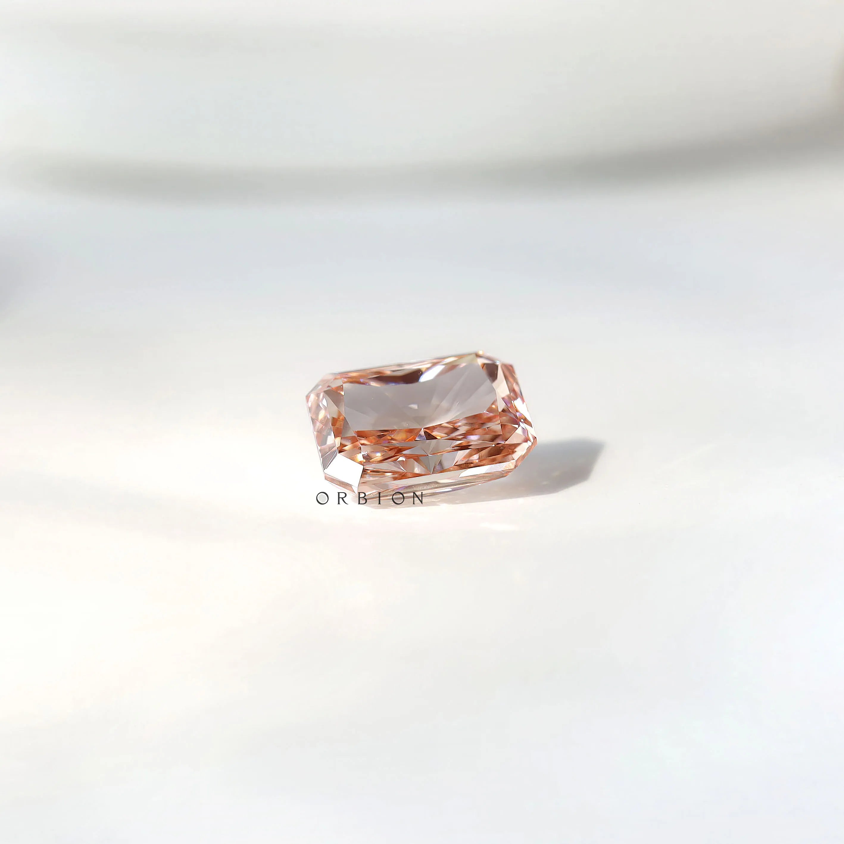 2 ct Radiant shape lab diamond with unique orangey pink shade