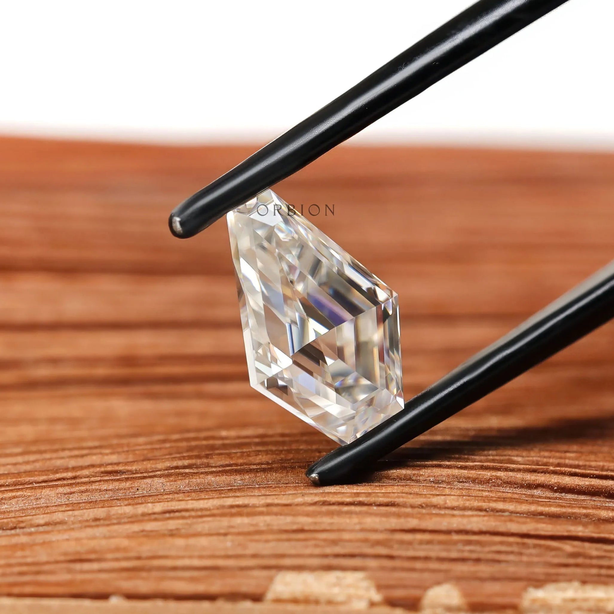 Loose coffin shaped moissanite fancy step cut in colorless tone